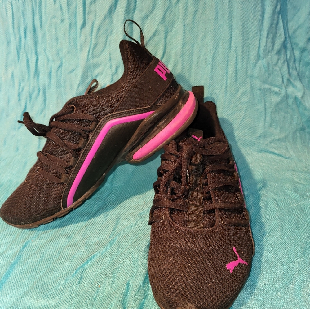 Black and pink puma running shoes
